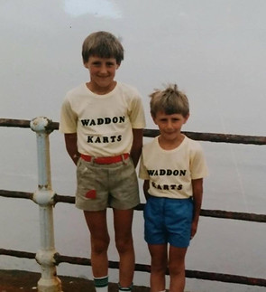 Two young brothers pictured together as children